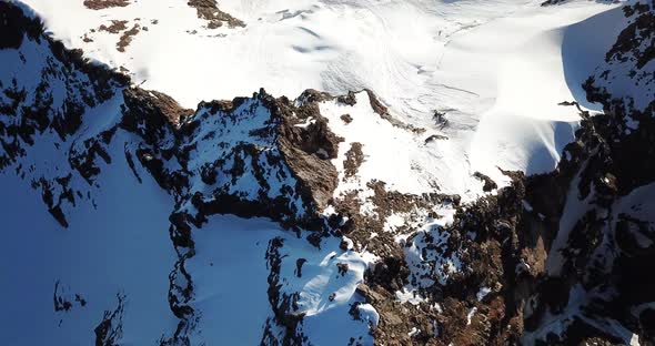 Rocky Mountain Peaks Covered with Snow. Shooting from A Drone, Top View