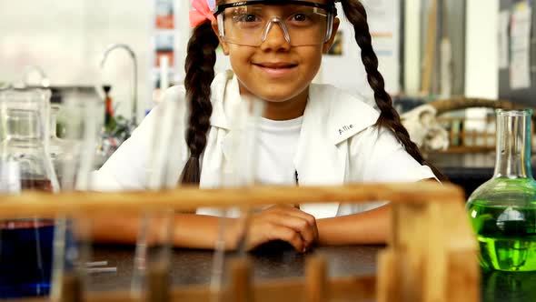 Portrait of happy schoolkid wearing protective eyewear 4k