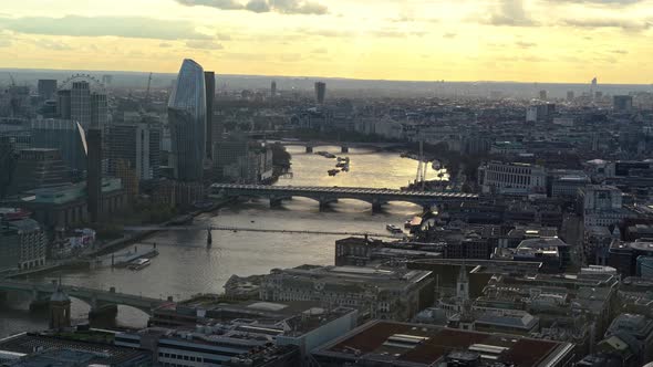 Mystic birds eye shot of beautiful London City with modern buildings and famous river during golden