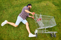 Young man with supermarket cart - PhotoDune Item for Sale