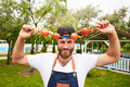 Young man with vegetable skewers - PhotoDune Item for Sale