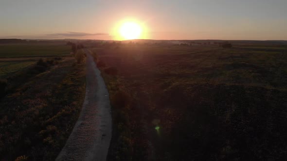 Idyllic Sunset Over Road at Countryside