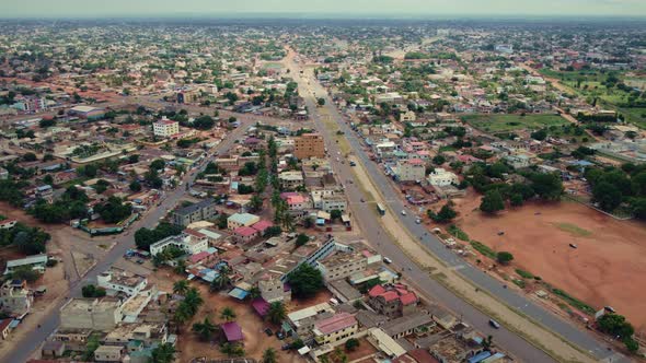 CInematic Circular Motion Aerial View of African City Road with Traffic, Lomé West Africa