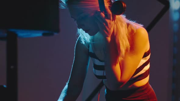 Beautiful DJ Woman Playing Set