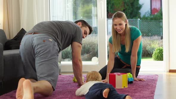 Father and son Crawling to Mom