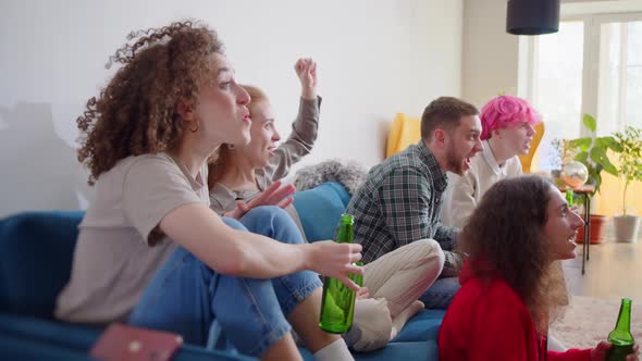 Cheerful Happy Caucasian Guys Cheering for Favorite Team and It Scoring Goal and Winning Game