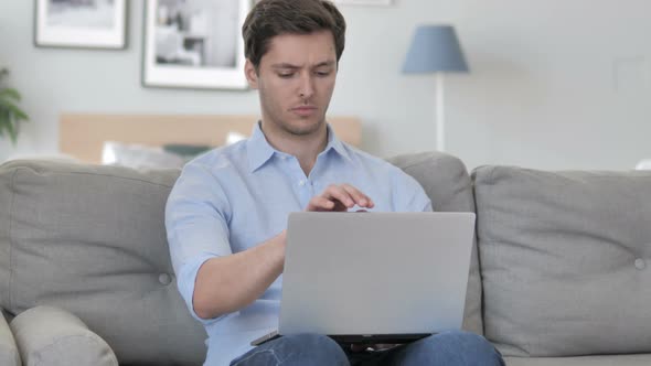 Man Leaving Creative Workplace after Completing Work