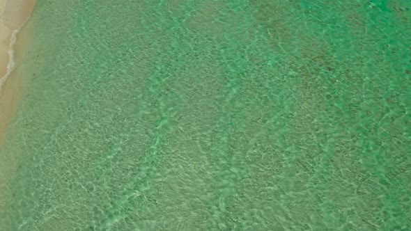 Ocean with Waves and Yellow Beach