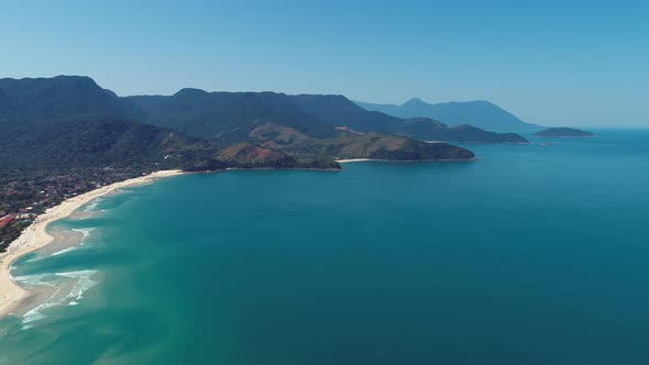 Brazilian Maresias beach landmark. Tropical summer beach.