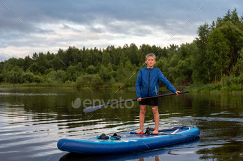 iful river. Rest. A boat with an oar. Holidays. Greens. Swimming. Child