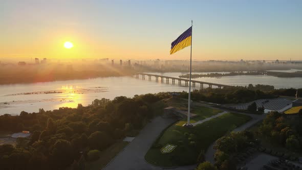 Ukrainian Flag in the Morning at Dawn. Aerial. Kyiv. Ukraine