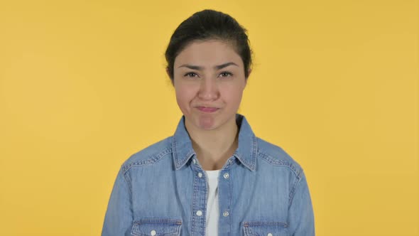 Indian Woman Shaking Head As No Sign Yellow Background