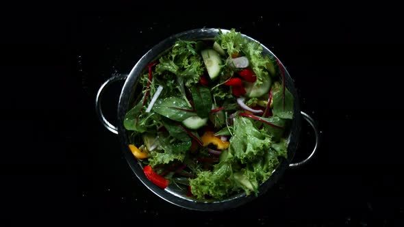 Super Slow Motion Shot of Flying and Rotating Cuts of Colorful Vegetables at 1000Fps.