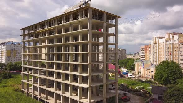 Aerial View of City Residential Area with High Monolithic Apartment Building Under Construction