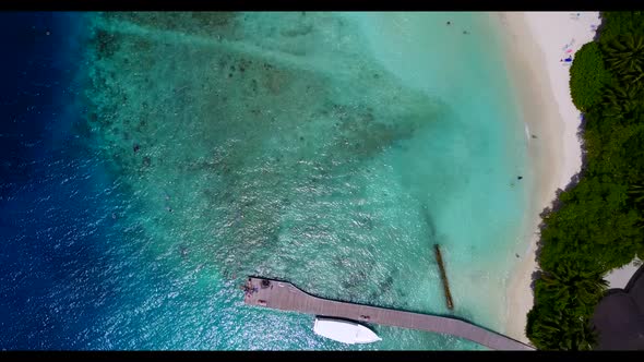 Aerial view texture of tropical coastline beach break by turquoise sea with white sandy background o