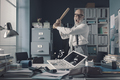 Crazy businessman destryoing his office with a baseball bat - PhotoDune Item for Sale