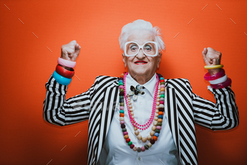sing elegant for a special event. granny fashion model on colored backgrounds