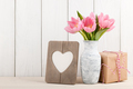 Fresh pink tulips, blank frame and gift box - PhotoDune Item for Sale