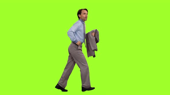 Businessman Running on Green Background, Chroma Key