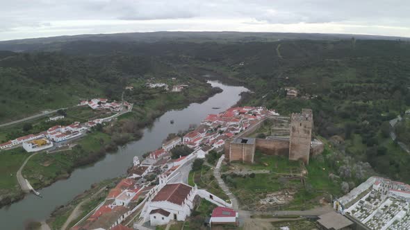 Aerial drone view of Mertola in Alentejo, Portugal at sunset