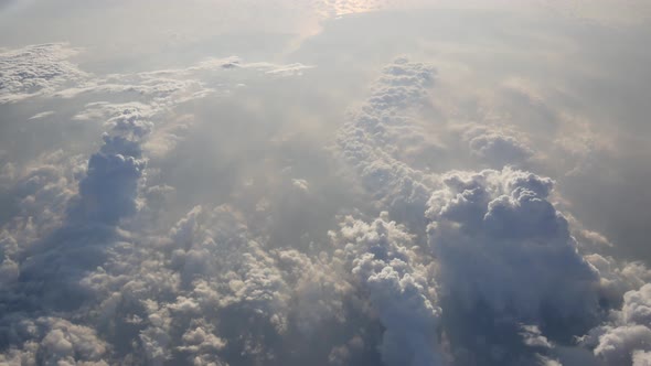 Cumulus cloud during sunset hour vire from plane