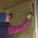 Woman Laying Insulation - VideoHive Item for Sale