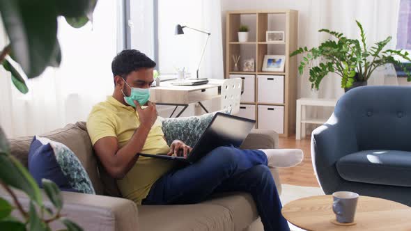 Indian Man in Mask with Laptop at Home Office