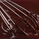 Chocolate. Stirring melted liquid chocolate with steel whisk - VideoHive Item for Sale