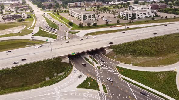 Busy Highway In The Diverging Diamond Road in Michigan USA - aerial shot