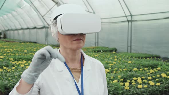 Agricultural Engineer Using VR Headset