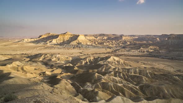 Timelapse video at Sde Boker, in the Neguev desert of Israel. Dry river in the desert landscape. alt