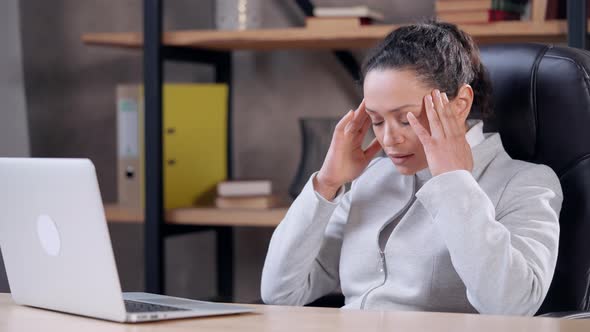 Exhausted Business Woman at the End of Workday