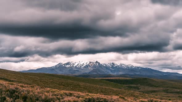 Dark Dramatic Clouds over Mount Ruapehu Volcano Mountain in Wild Nature of New Zealand Landscape 