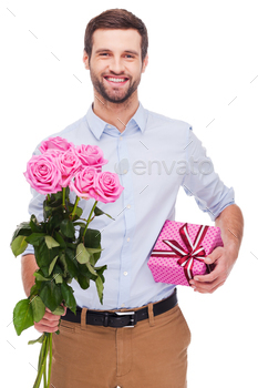 ox and stretching out bouquet with pink roses while standing isolated on white background
