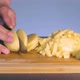 Chef Slicing Potato and Preparing Ingredients - VideoHive Item for Sale