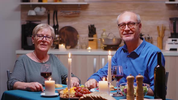 Elderly Couple Having a Video Call