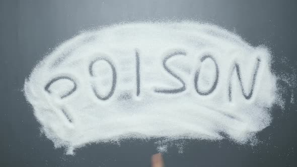 Word poison written on sugar.