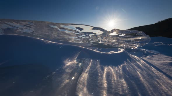 Timelapse of Sunset Trough Transparent Piece of Icicle