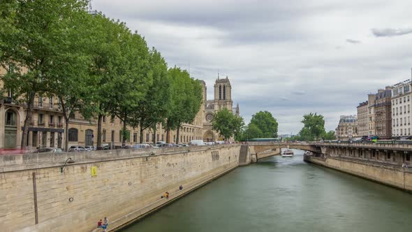 Notre Dame De Paris and Seine Timelapse Hyperlapse is the One of the Most Famous Symbols of Paris