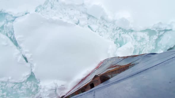 Bow Of A Ship Going Through Pack Ice In Antarctica