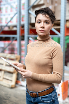 Warehouse manager searching for set number of item on tablet