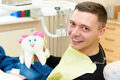 Happy young man in dental clinic - PhotoDune Item for Sale