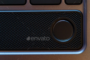 Close up photo of laptop fingerprint sensor button