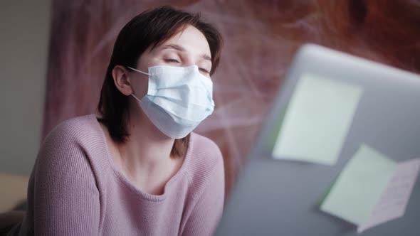 Ill Woman Wearing Medical Mask at Home Self Quarantine