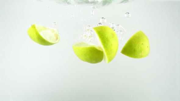 Limes Falling into Water 04