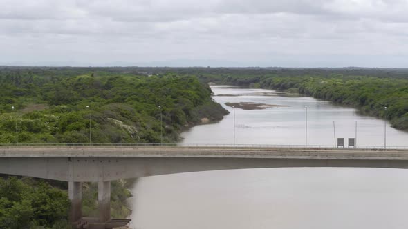 Cars Crossing Amazon Jungle Bridge