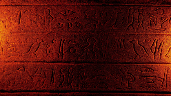 Egyptian Wall Carvings Lit Up With Torches