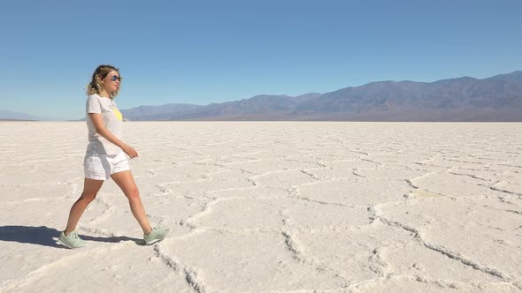 Happy Woman Traveler Walking By Cinematic White Death Valley National Park USA