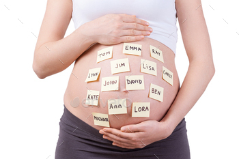  woman with baby names on her belly standing isolated on white