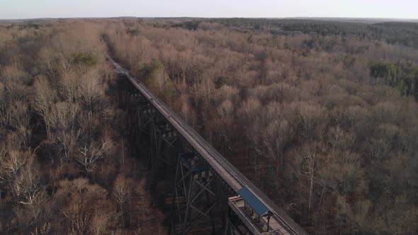 A dramatic orbital shot over High Bridge Trail, a reconstructed Civil War era railroad bridge in Vir